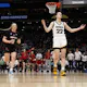 Caitlin Clark of the Iowa Hawkeyes reacts during a game against the Louisville Cardinals in the NCAA Women's Basketball Tournament at Climate Pledge Arena in Seattle, Washington. Photo by Steph Chambers/Getty Images via AFP.
