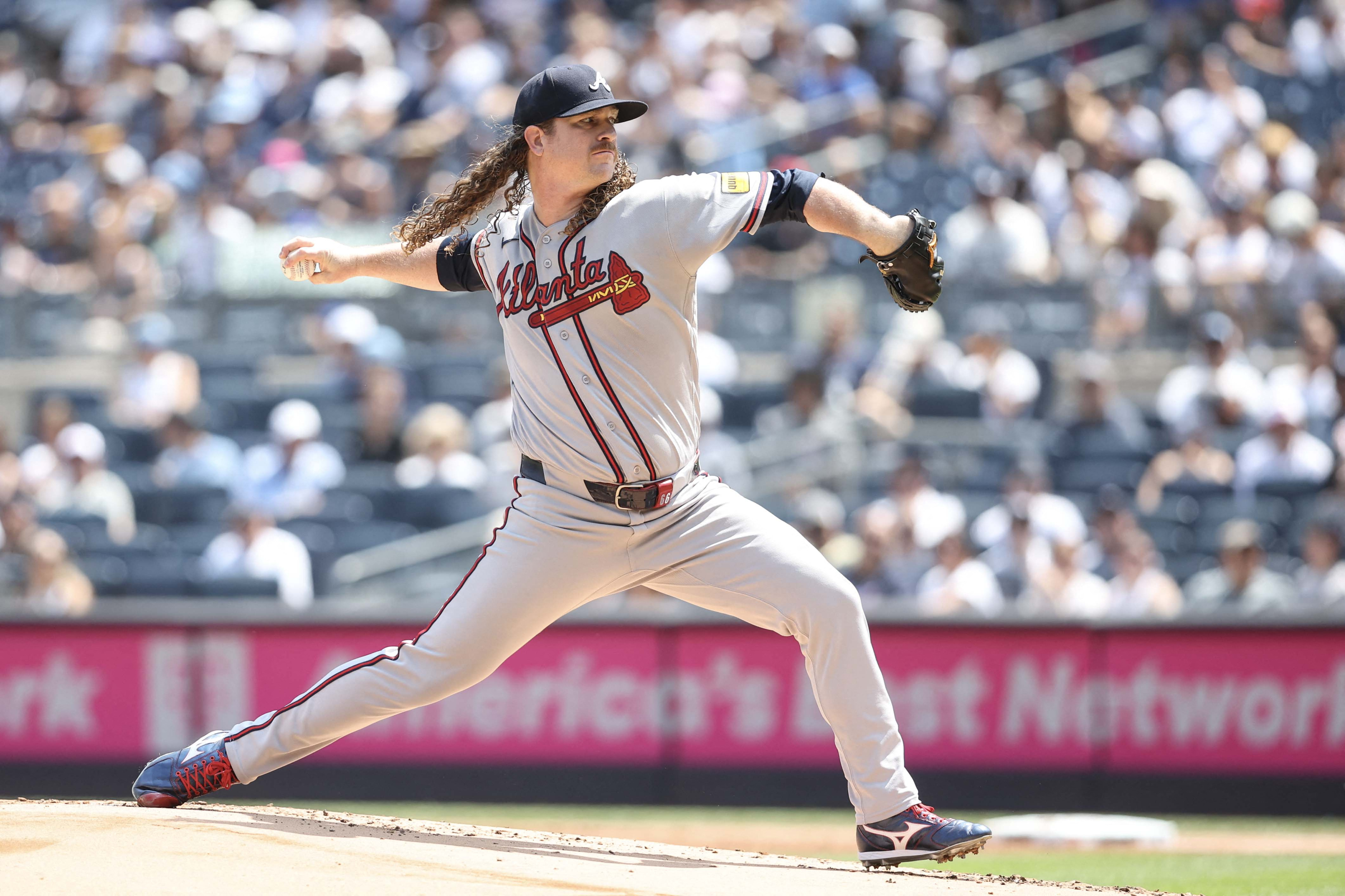 Atlanta Braves starting pitcher Grant Holmes (66) pitches in the first inning as he is featured in our Diamondbacks vs. Braves win probability. 