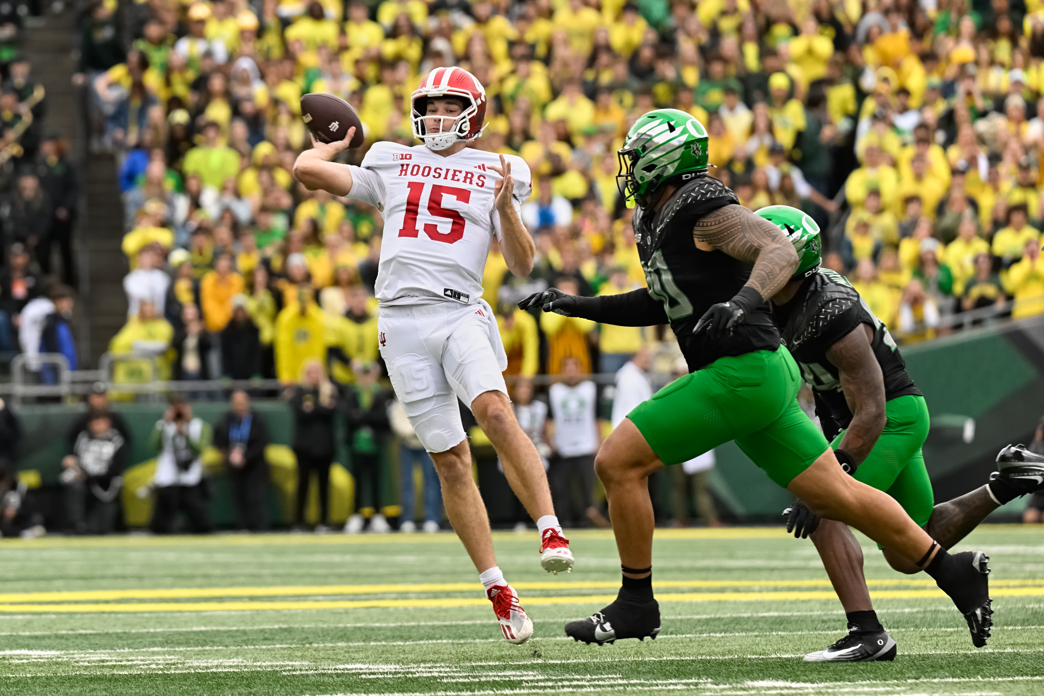 Indiana quarterback Fernando Mendoza (15) is key to our Oregon vs. Indiana predictions for the College Football Playoff semifinal in the Peach Bowl.