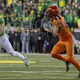 Quarterback Bo Nix #10 of the Oregon Ducks passes the ball as we look at the best Heisman Trophy odds