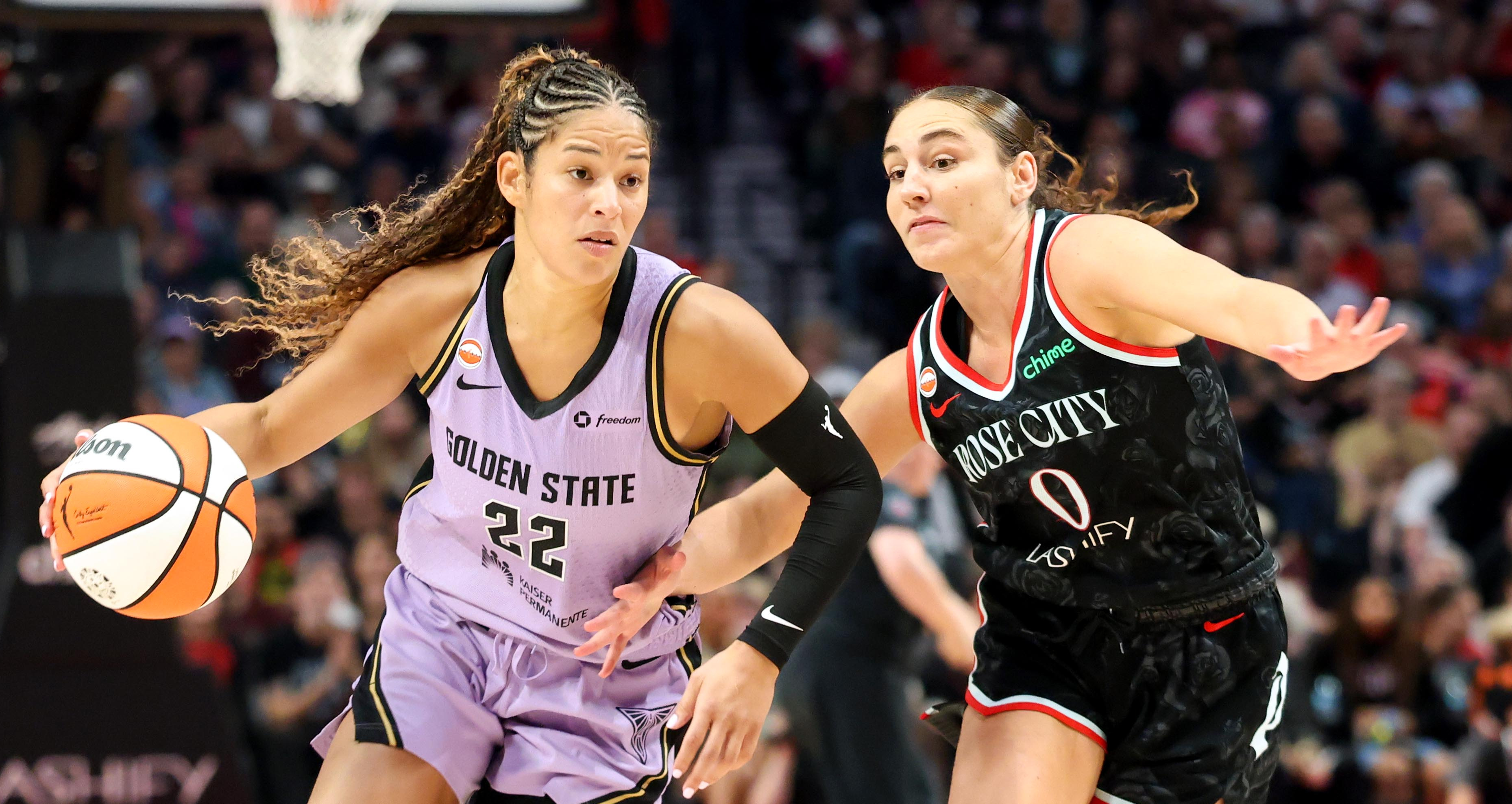 Golden State Valkyries guard Veronica Burton (22) dribbles the ball past Portland Fire guard Carla Leite (0 as we break down our Wings vs. Valkyries prediction