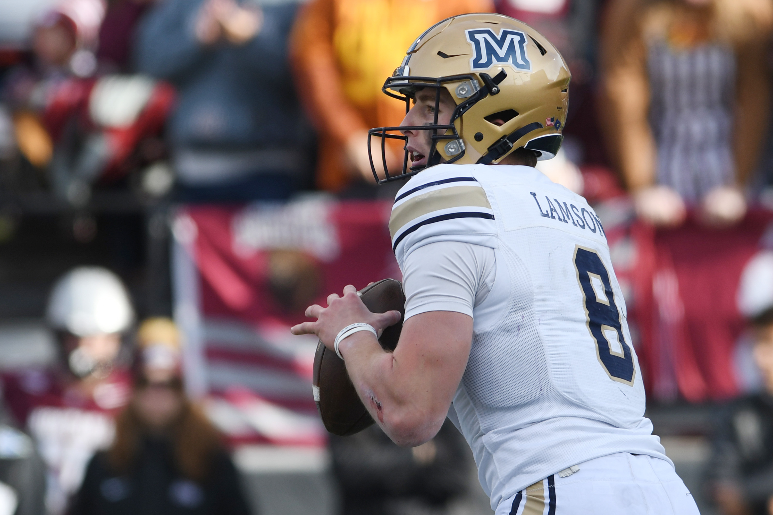 Montana State Bobcats quarterback Justin Lamson looks to pass the ball as we look at Kalshi's legal fight in the state