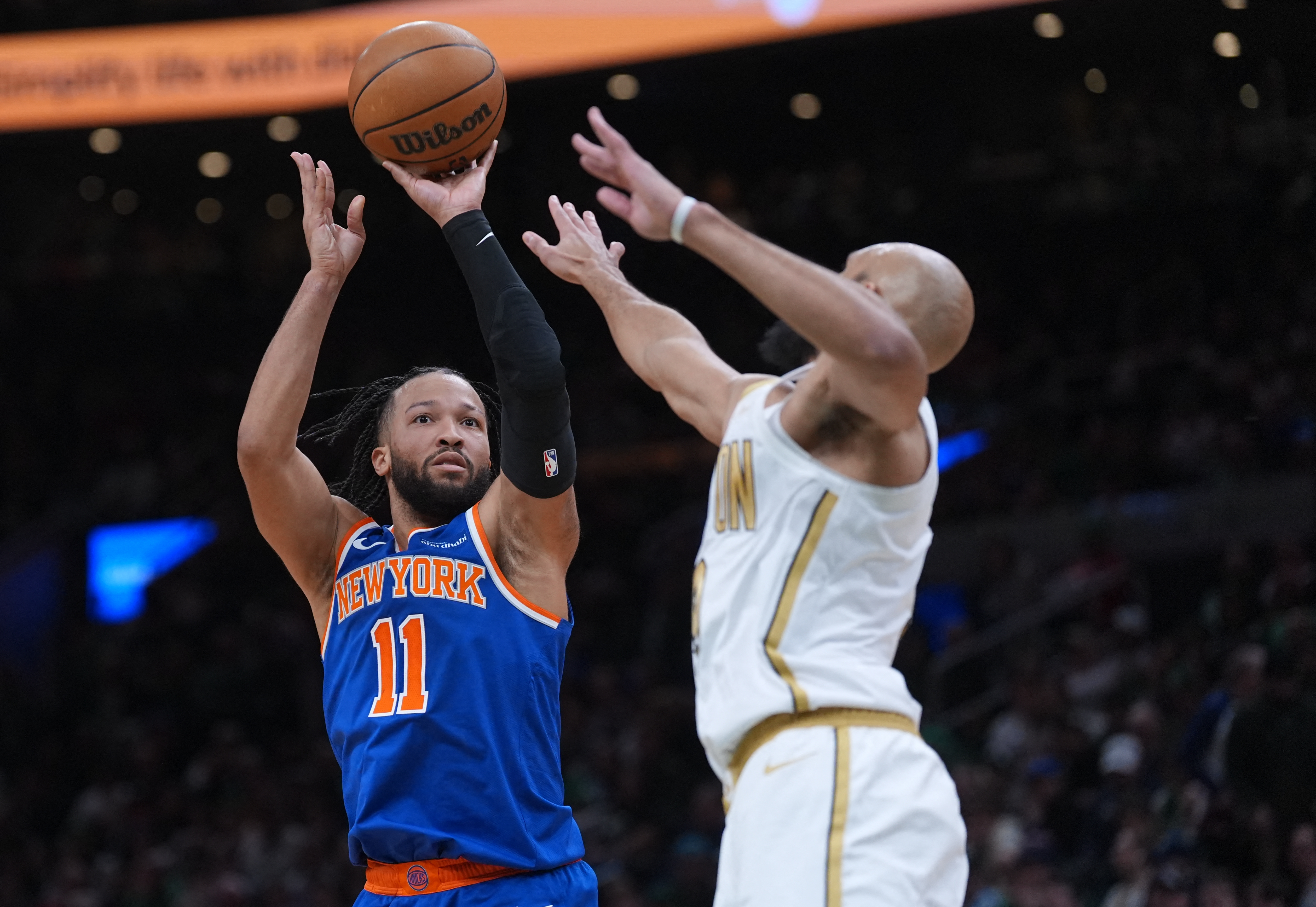 New York Knicks guard Jalen Brunson shoots the ball against Boston Celtics guard Derrick White, and he headlines our NBA player props today.