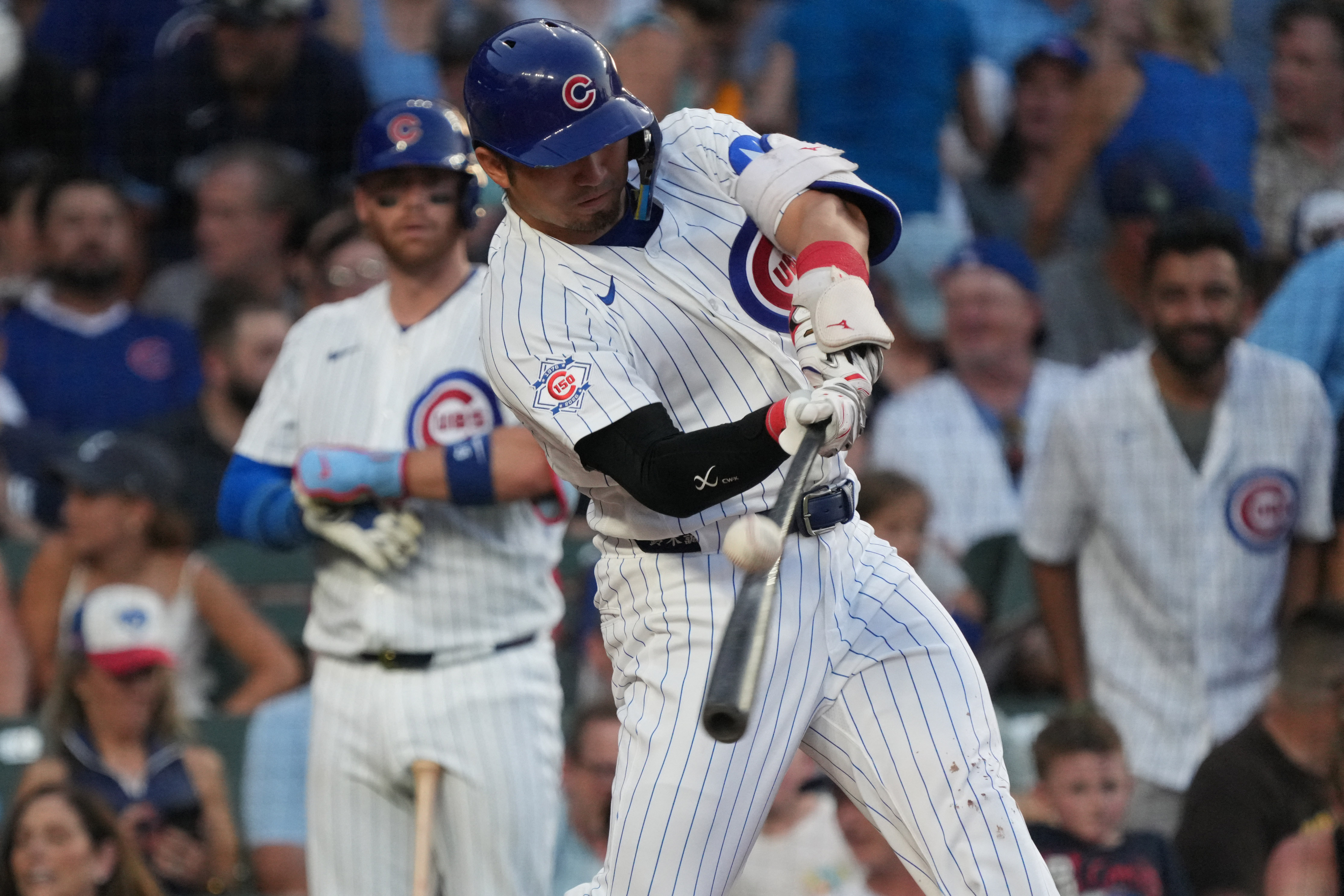  Chicago Cubs designated hitter Seiya Suzuki - who's featured in my Cardinals vs. Cubs prediction - hits a single. 