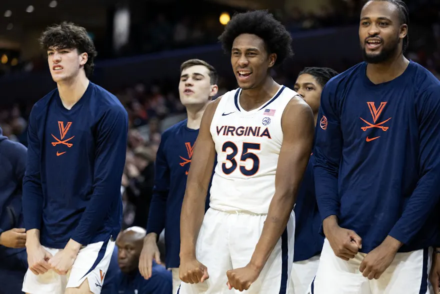 Leon Bond III #35 of the Virginia Cavaliers cheers in the second half as we look at Virginia's sports betting financials for November 2023