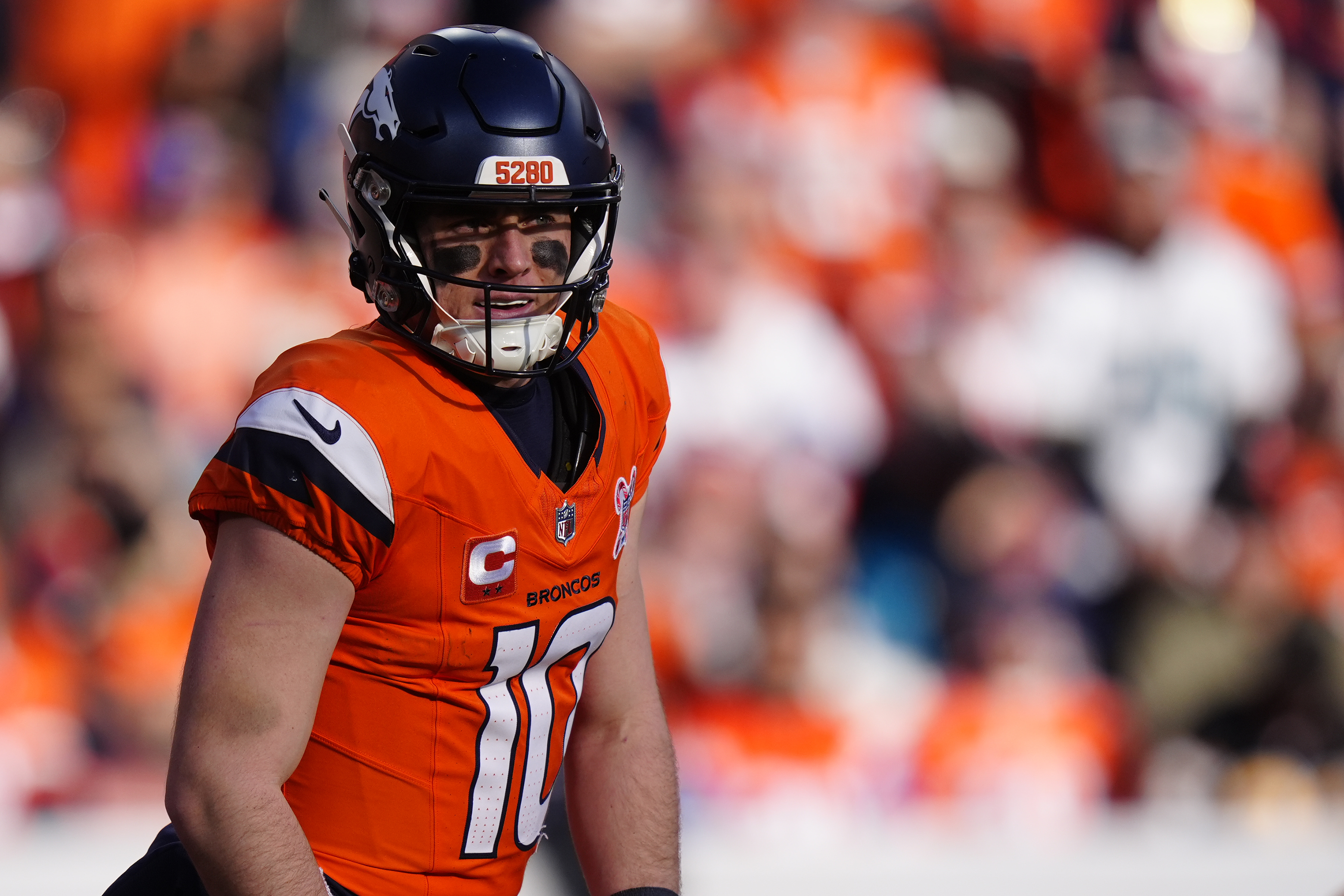 Denver Broncos quarterback Bo Nix (10) looks on as we offer our Broncos vs. Chiefs predictions.