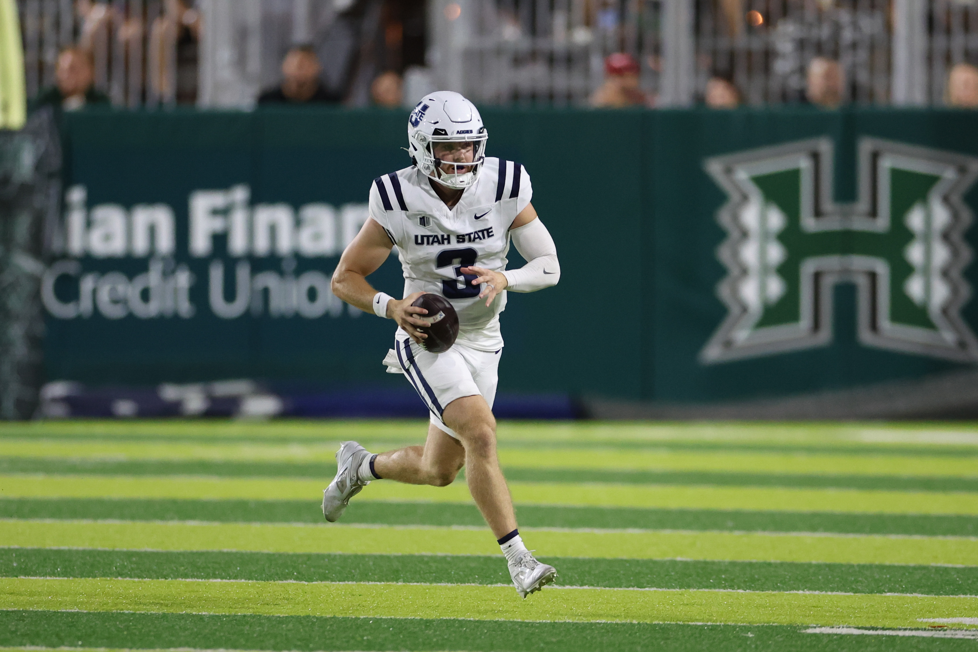 Utah State quarterback Jacob Conover (3) in action as we look at the college football bowl game odds and schedule