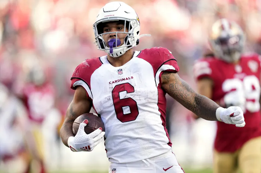 James Conner of the Arizona Cardinals runs the ball for a touchdown during the third quarter against the San Francisco 49ers, and we share our exclusive FanDuel promo code with new U.S. bettors ahead of the Broncos vs. Cardinals game.