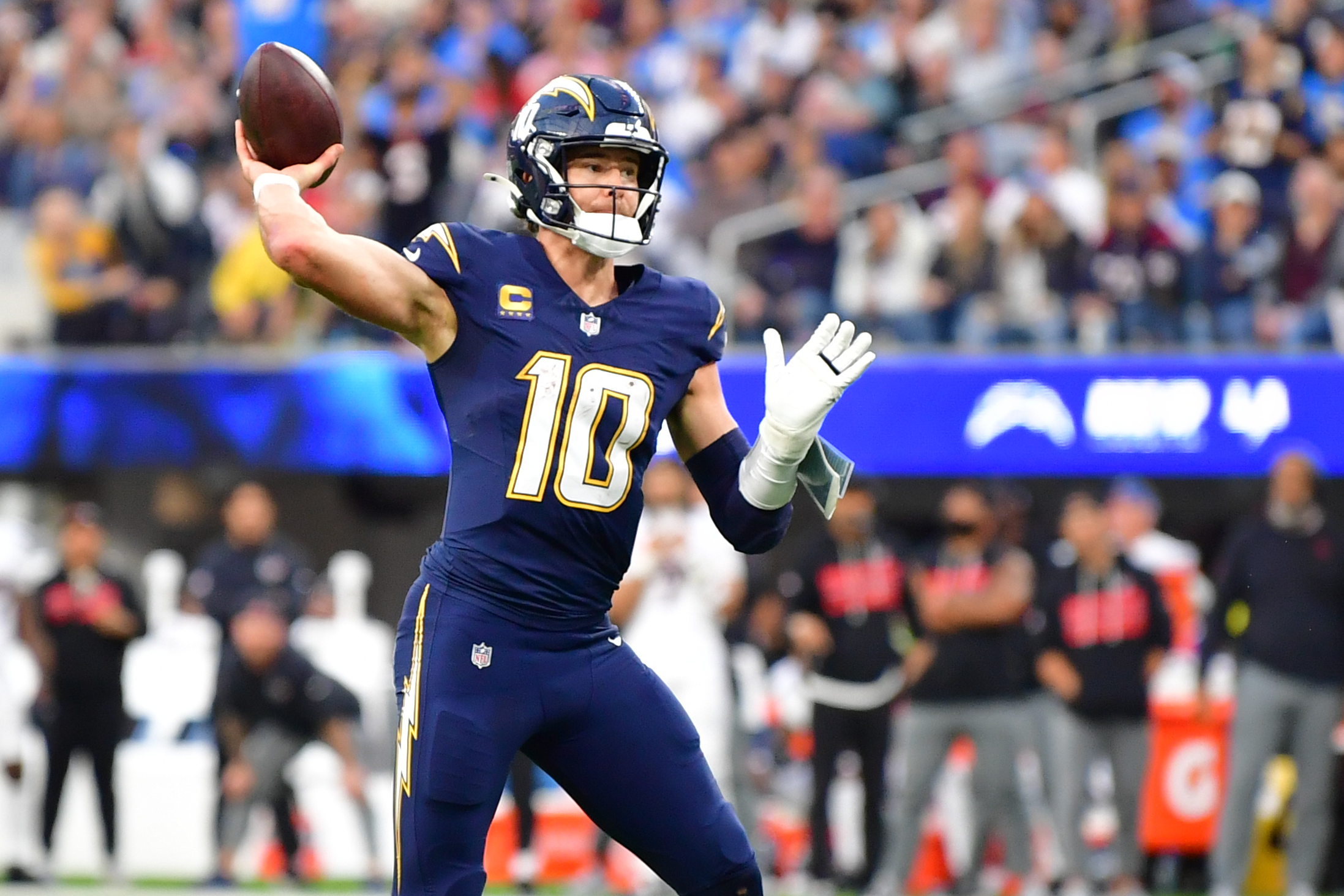 Justin Herbert throws a touchdown pass as we offer our Wild Card Round long-shot parlay. 