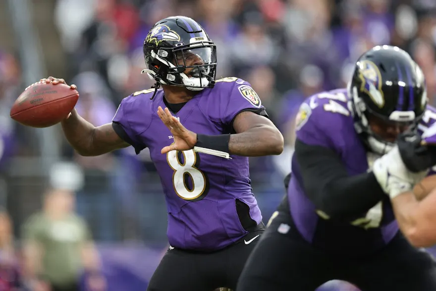 Quarterback Lamar Jackson #8 of the Baltimore Ravens looks to pass against the Minnesota Vikings in overtime at M&T Bank Stadium on Nov. 7, 2021.