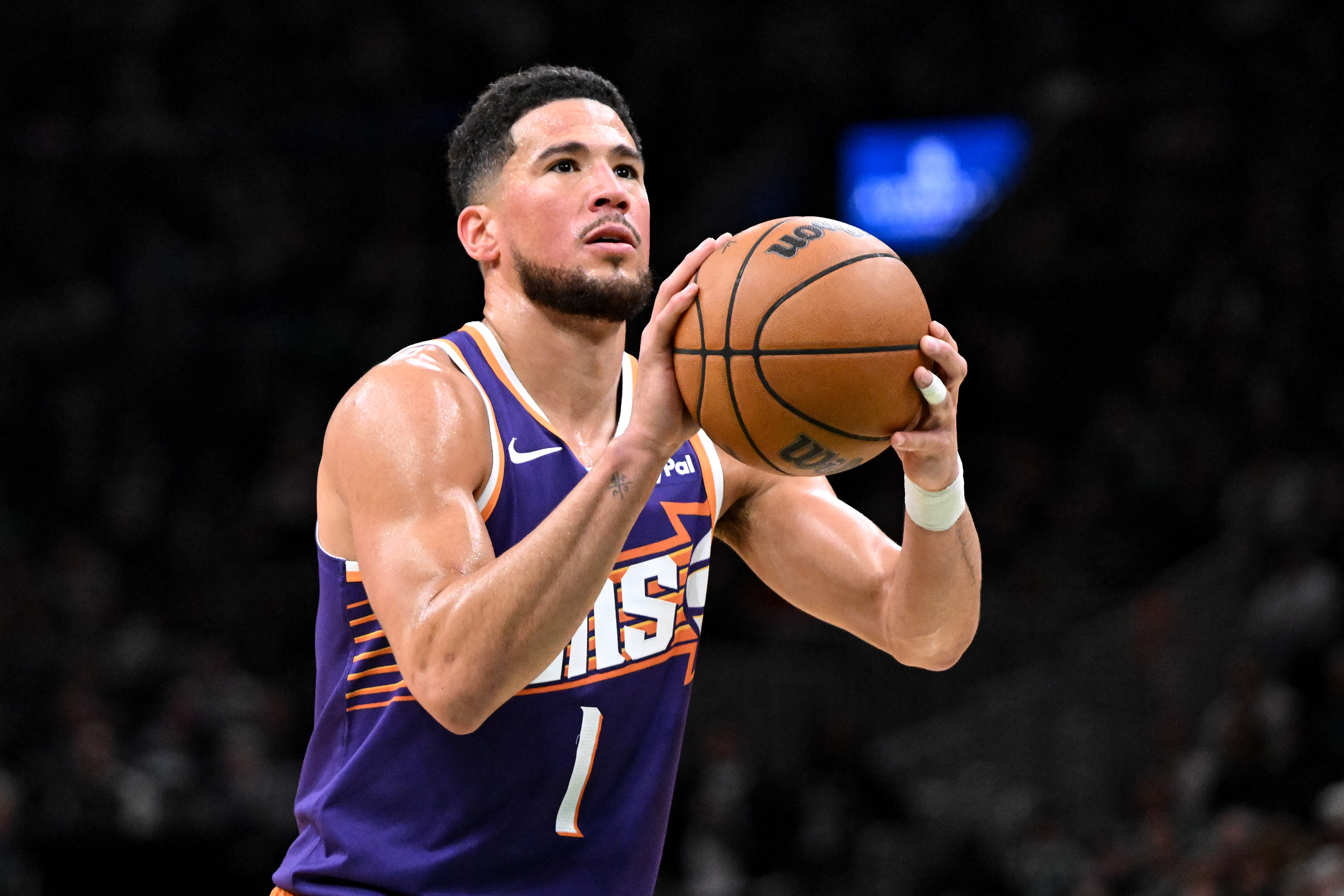 Phoenix Suns guard Devin Booker (1) attempts a free throw as we break down our  NBA Play of the Day. 