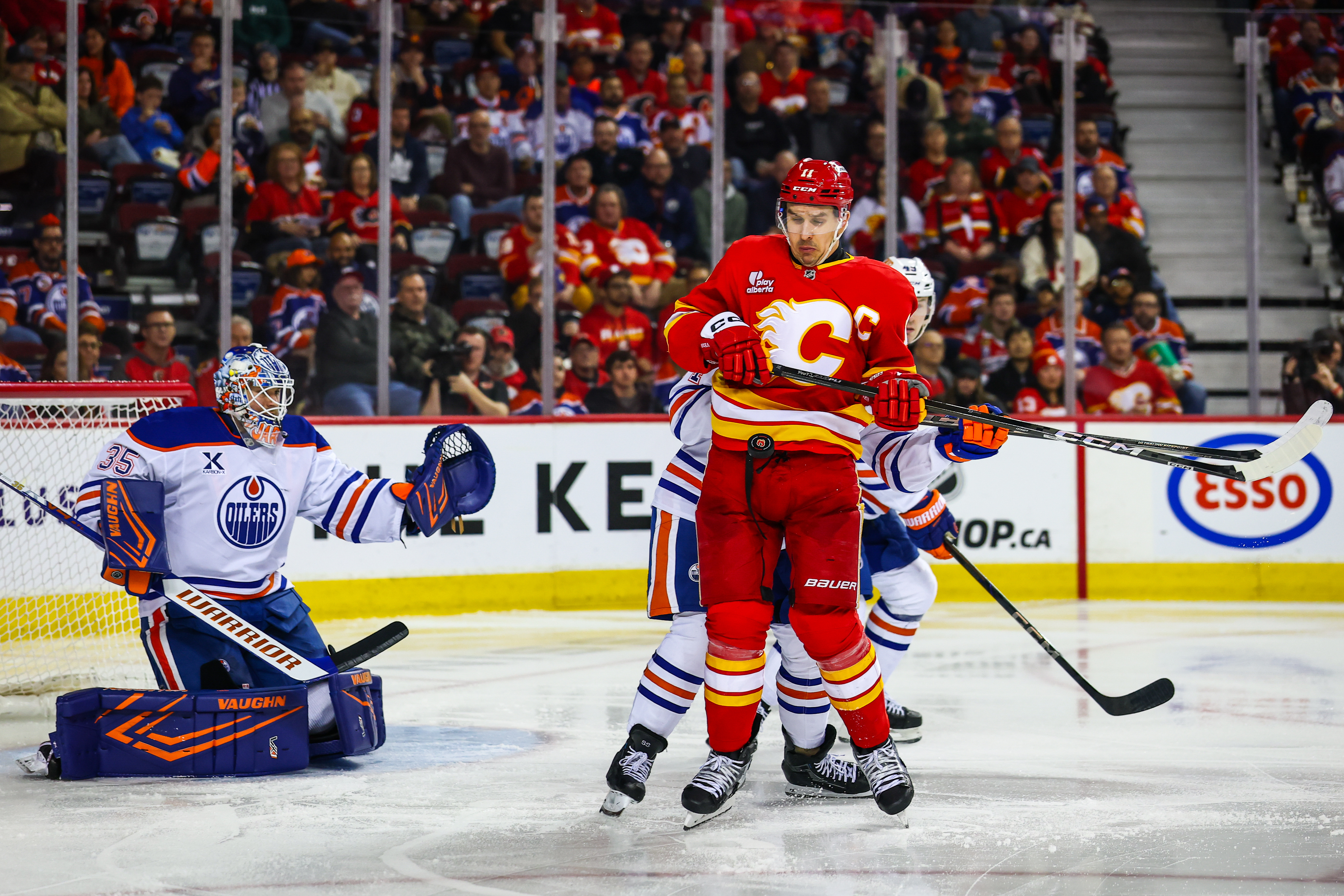 Calgary Flames center Mikael Backlund screens in front of Edmonton Oilers goaltender Tristan Jarry as we look at Caesars offering pre-registration in the Alberta market.