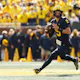 J.J. McCarthy of the Michigan Wolverines looks to pass against the Penn State Nittany Lions at Michigan Stadium on Oct. 15, 2022 in Ann Arbor, Michigan.