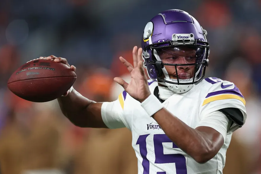 Quarterback Joshua Dobbs of the Minnesota Vikings warms up before the NFL game against the Denver Broncos as we look at our Josh Dobbs player prop picks.