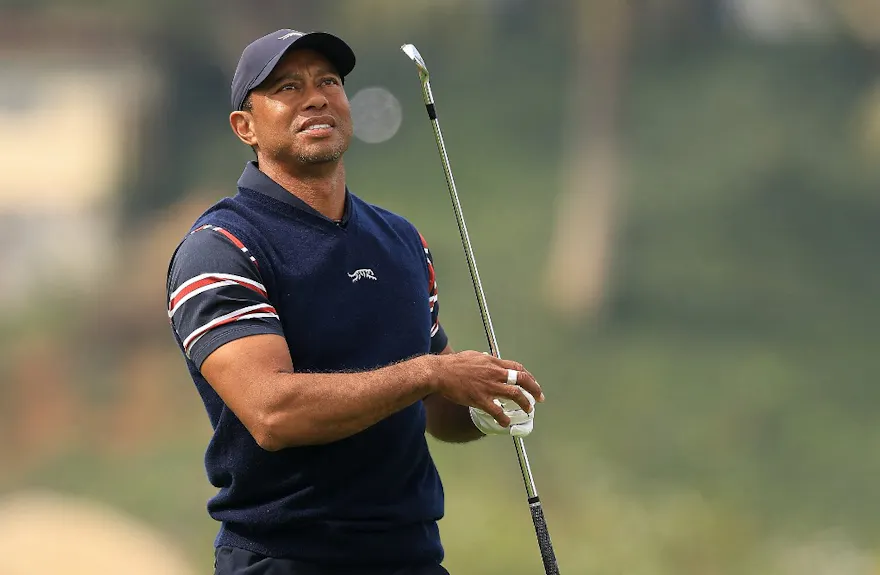 Tiger Woods of the United States plays a shot on the first hole as we look at Tiger Woods' Masters odds