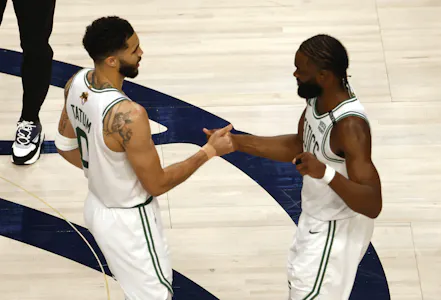 Boston Celtics forward Jayson Tatum and guard Jaylen Brown celebrate as we look at the 2024 NBA Finals odds
