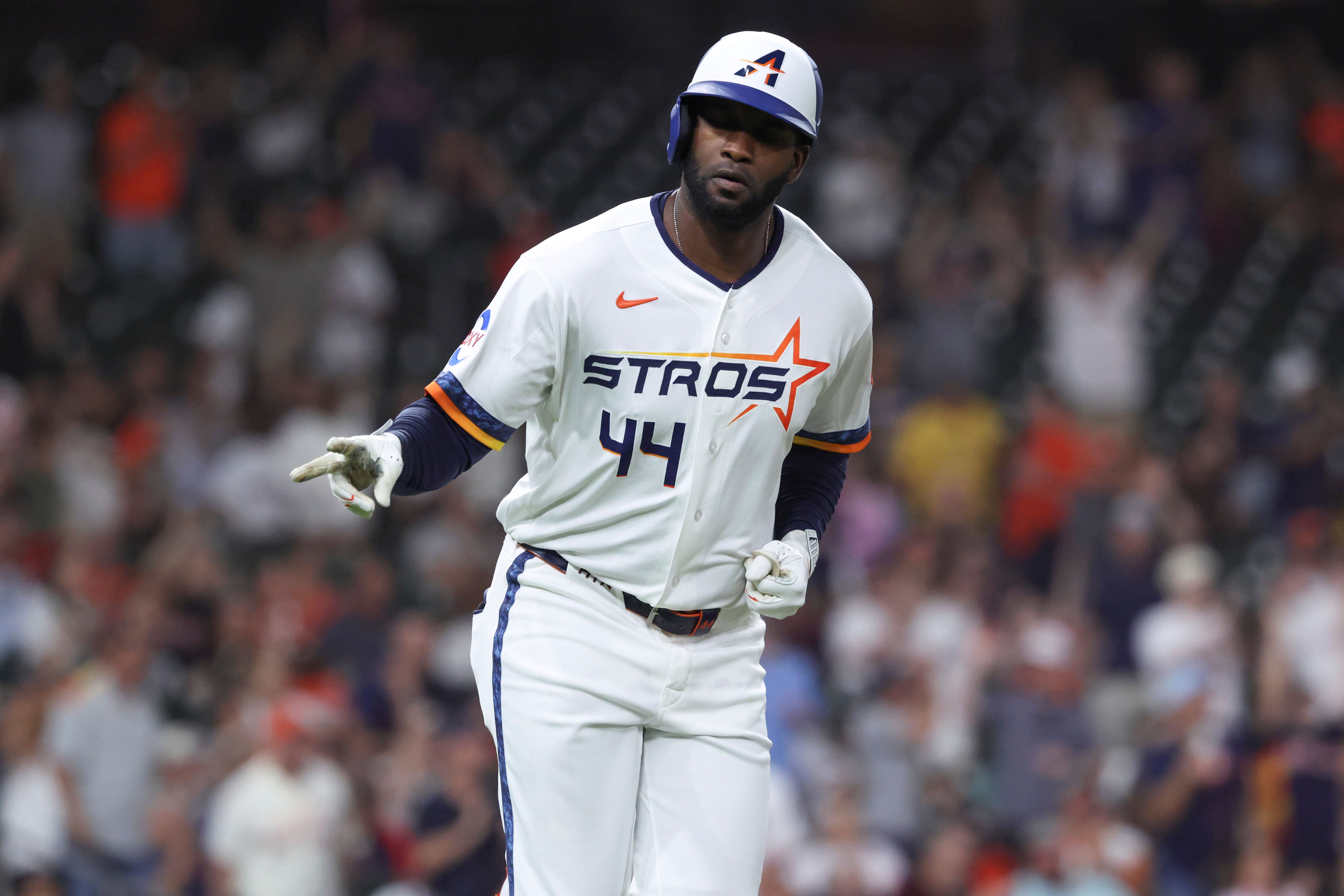 Houston Astros designated hitter Yordan Alvarez motions toward the dugout after hitting a home run, and he's key as we look at our best home run predictions today.