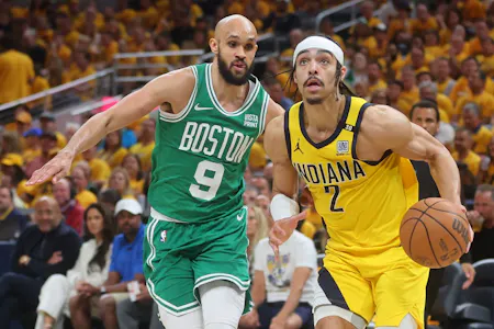 Andrew Nembhard of the Indiana Pacers drives to the basket against Derrick White of the Boston Celtics during Game 3 of the Eastern Conference Finals. We're backing White in our Celtics vs. Pacers Parlay. 