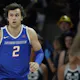 Tyson Degenhart of the Boise State Broncos brings the ball up the court against the Utah State Aggies, and we offer our top Colorado vs. Boise State prediction based on the best March Madness odds.