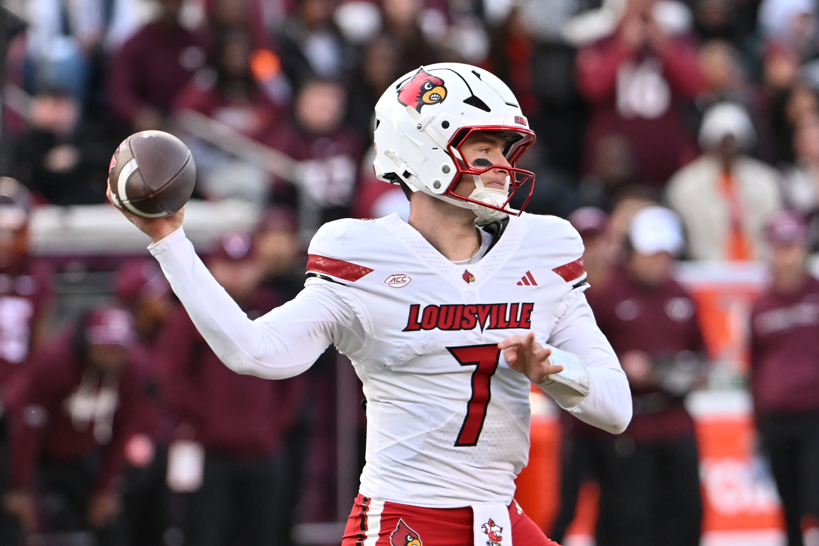 Louisville Cardinals quarterback Miller Moss (7) throws a pass as we break down our Toledo vs. Louisville predictions.