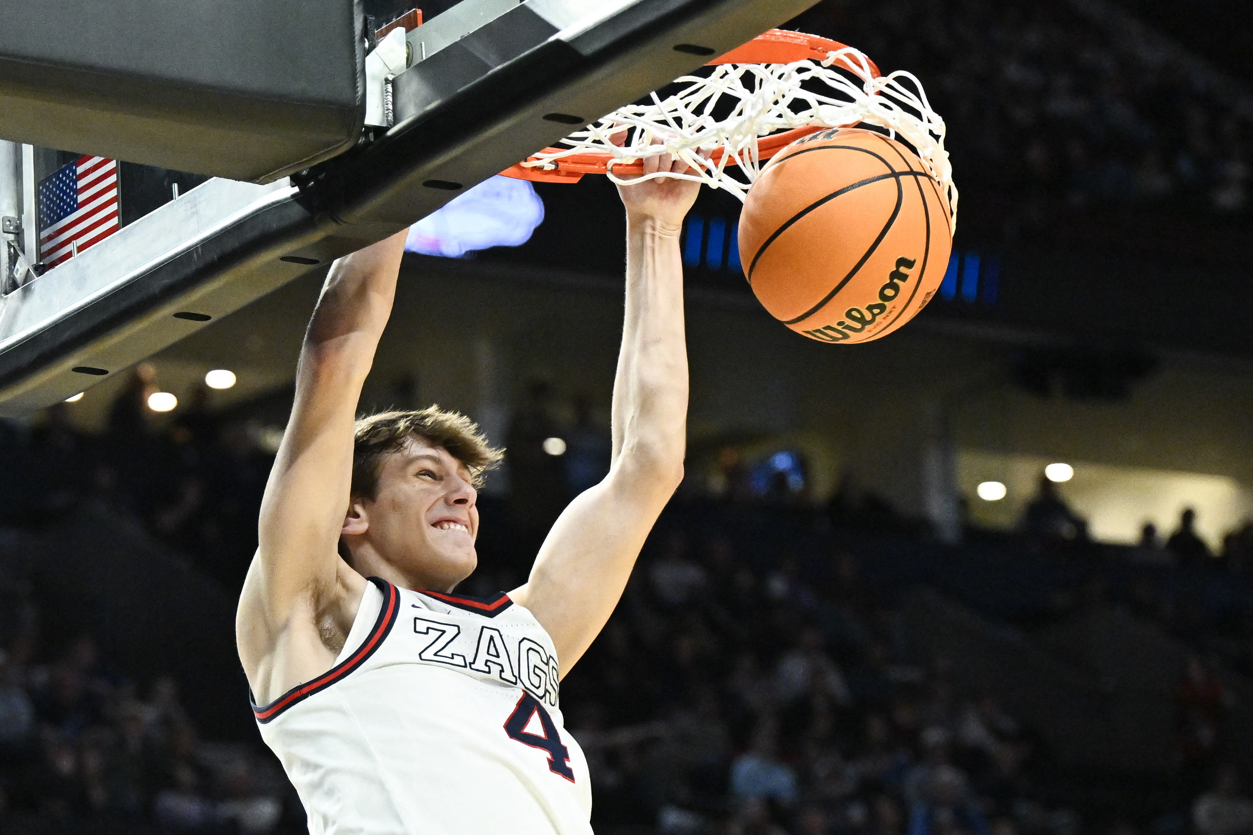 Gonzaga Bulldogs guard Davis Fogle (4) dunks as we break down our Texas vs. Gonzaga prediction.