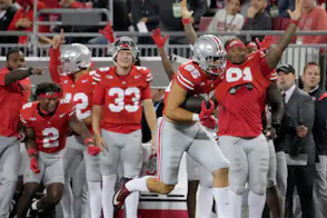 Ohio State Buckeyes tight end Bennett Christian runs for a touchdown as we look at a bill to introduce legal online casinos in Ohio.