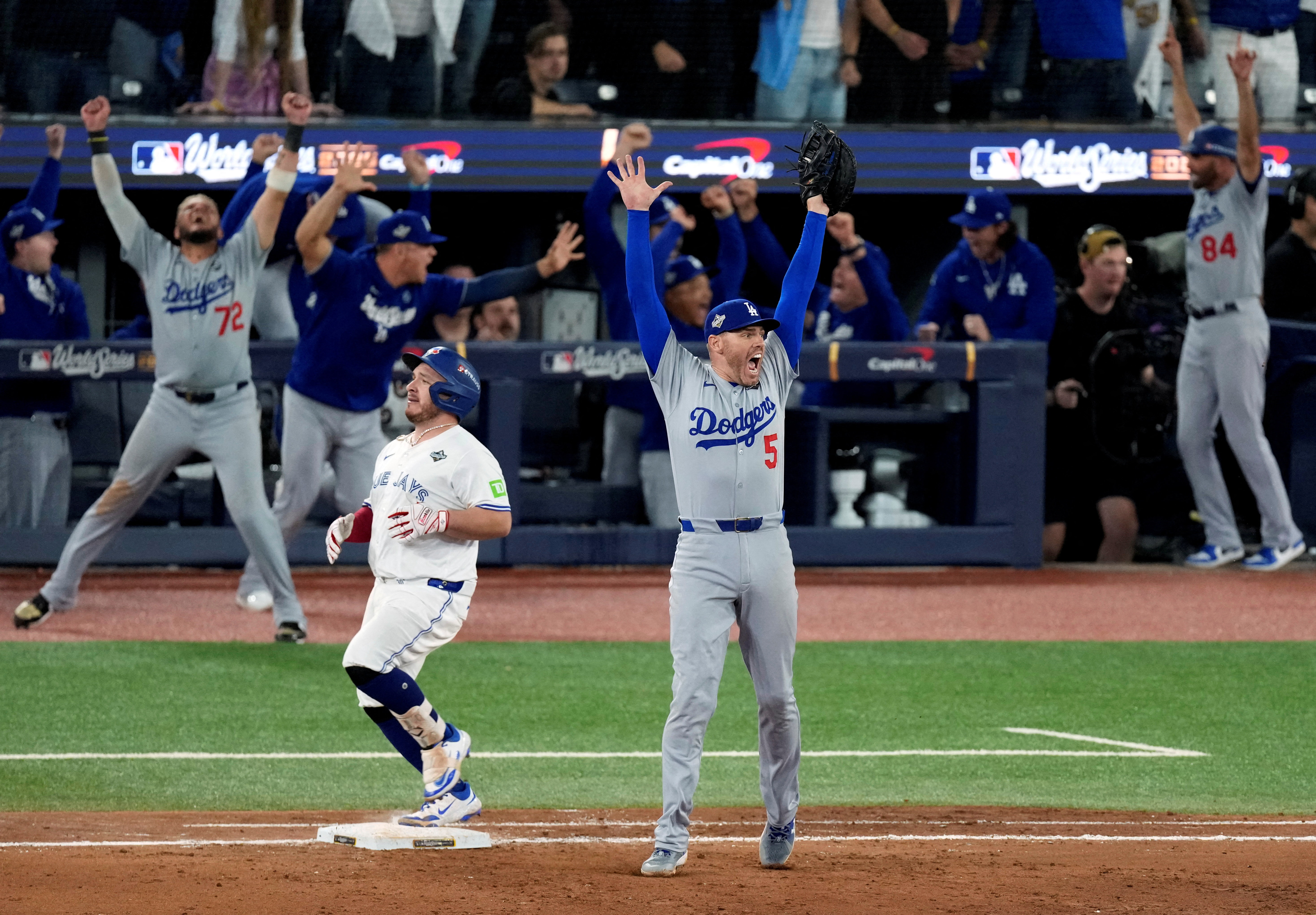 Los Angeles Dodgers first baseman Freddie Freeman celebrates after defeating the Toronto Blue Jays in Game 7 of the MLB World Series, as we look ahead to the 2026 MLB schedule and key dates.