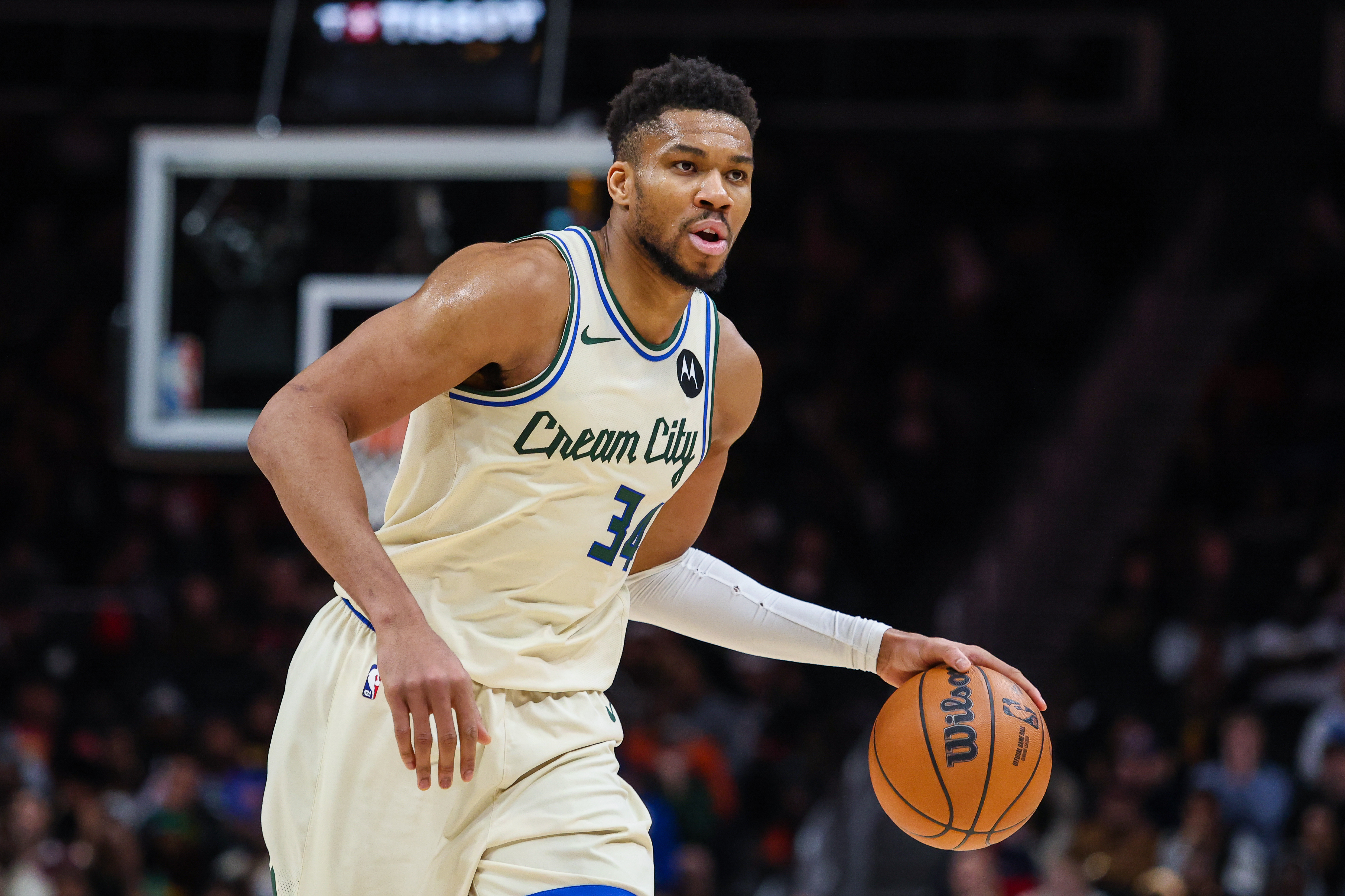 Milwaukee Bucks forward Giannis Antetokounmpo (34), seen here dribbling, is featured in our NBA player props and best bets tonight.