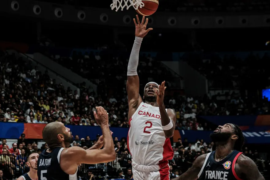 Canada's Shai Gilgeous-Alexander (C) makes a shot during the FIBA Basketball World Cup  as we look at the best Canada vs. Serbia prediction