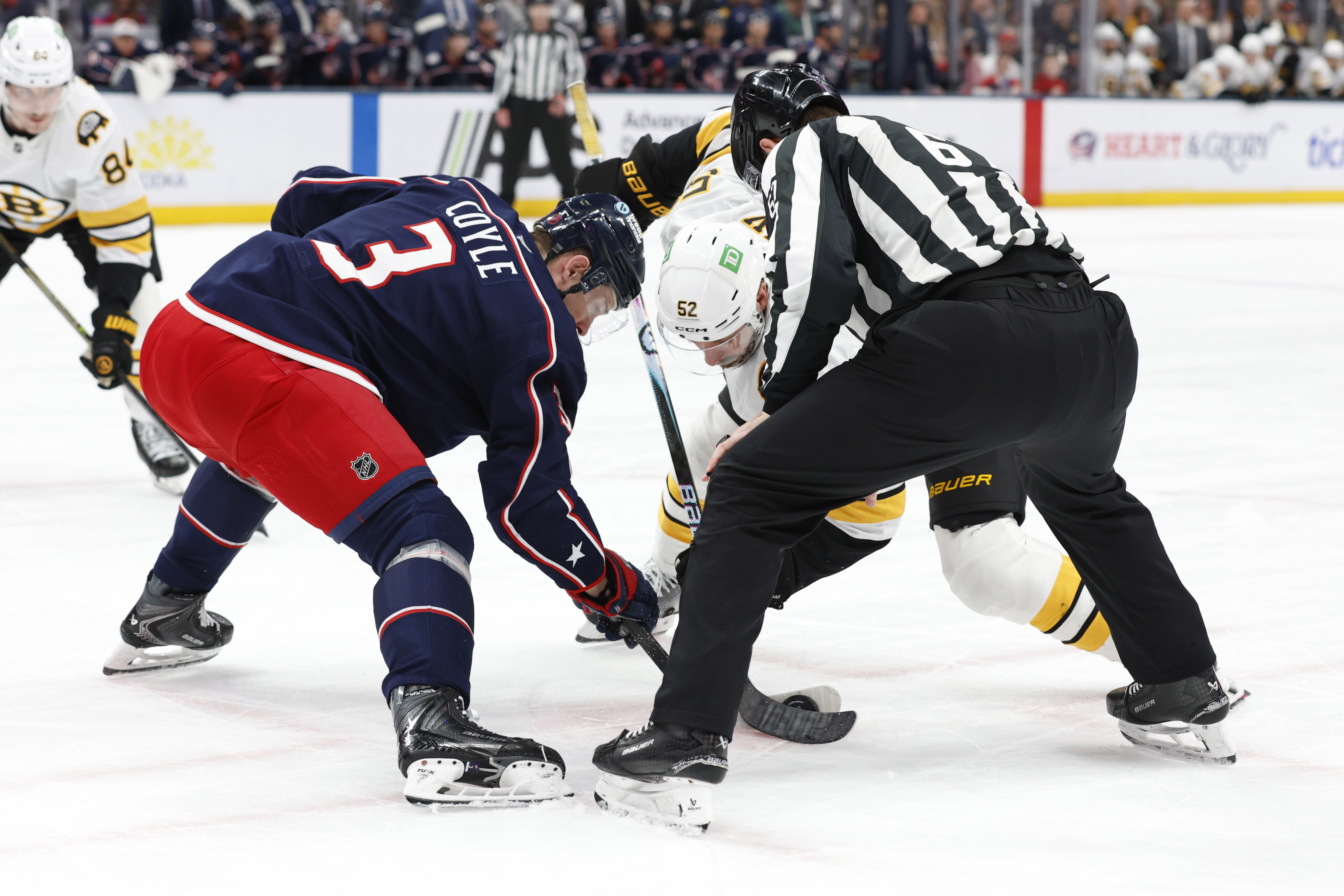 Columbus Blue Jackets center Charlie Coyle takes a faceoff as we make our best Bruins vs. Blue Jackets prediction.