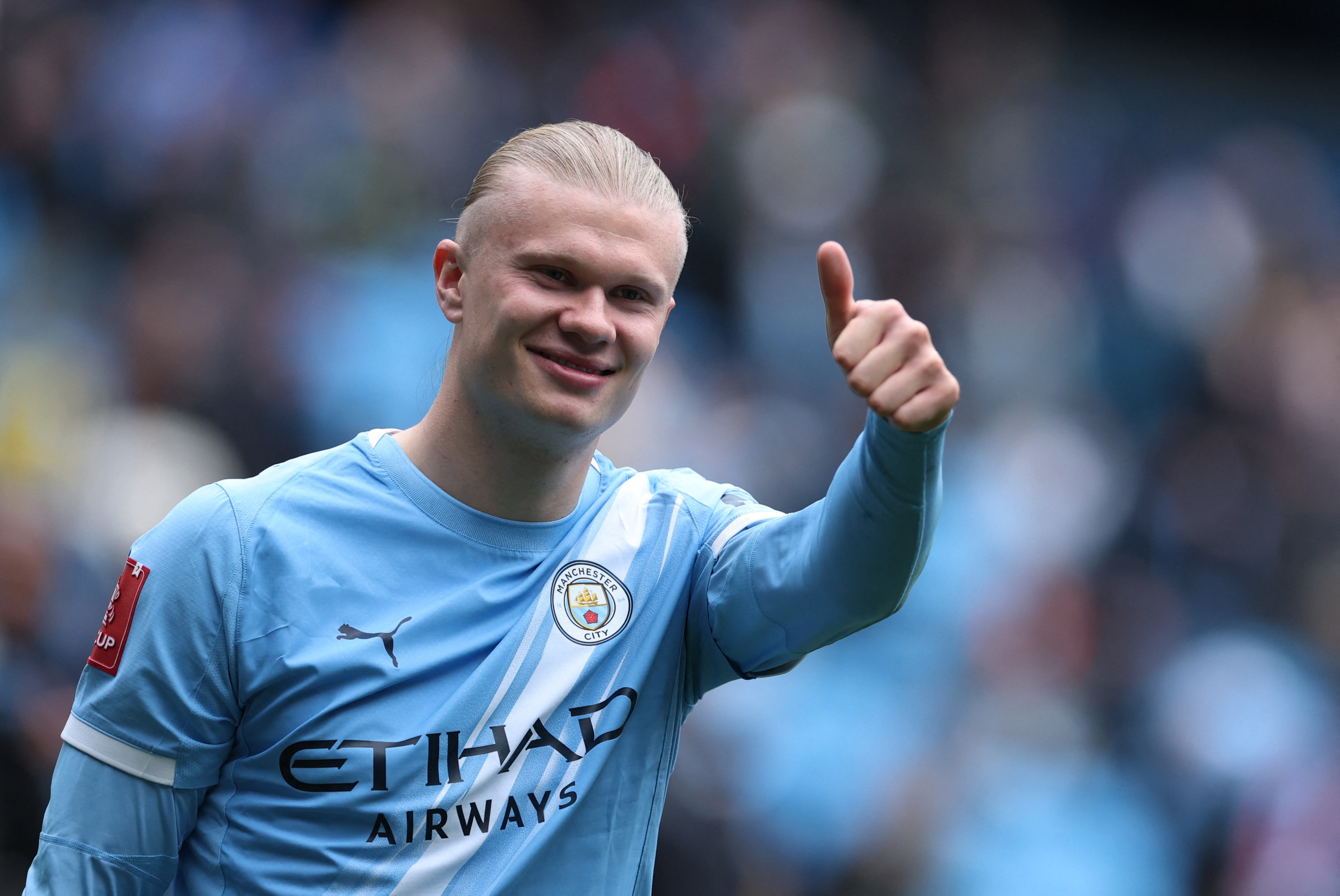 Manchester City's Erling Haaland celebrates as he is featured in our Chelsea vs. Manchester City prediction.