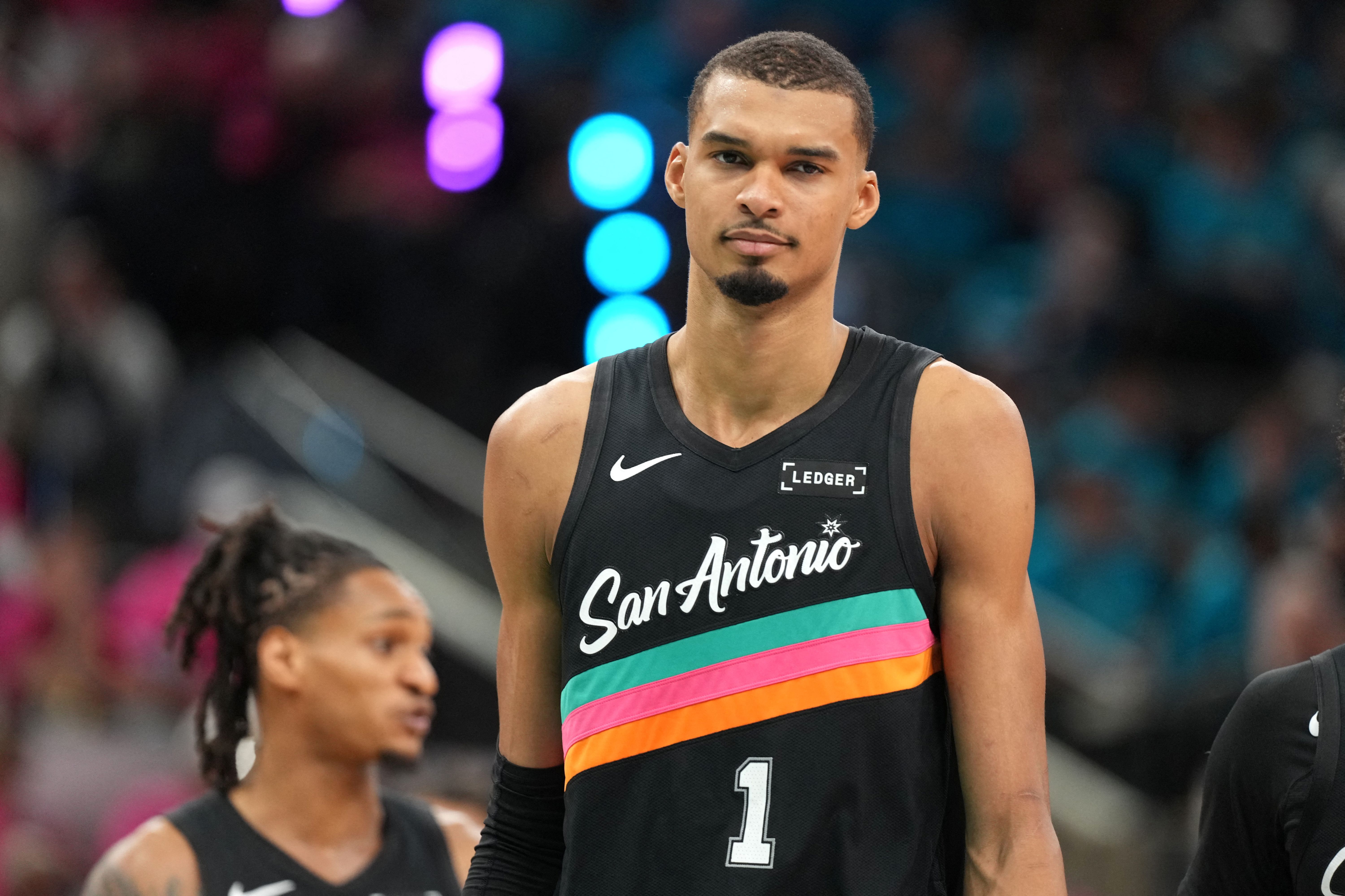 San Antonio Spurs forward Victor Wembanyama (1), seen here reacting during a game, is featured in our Trail Blazers vs. Spurs player props for Game 2 today.