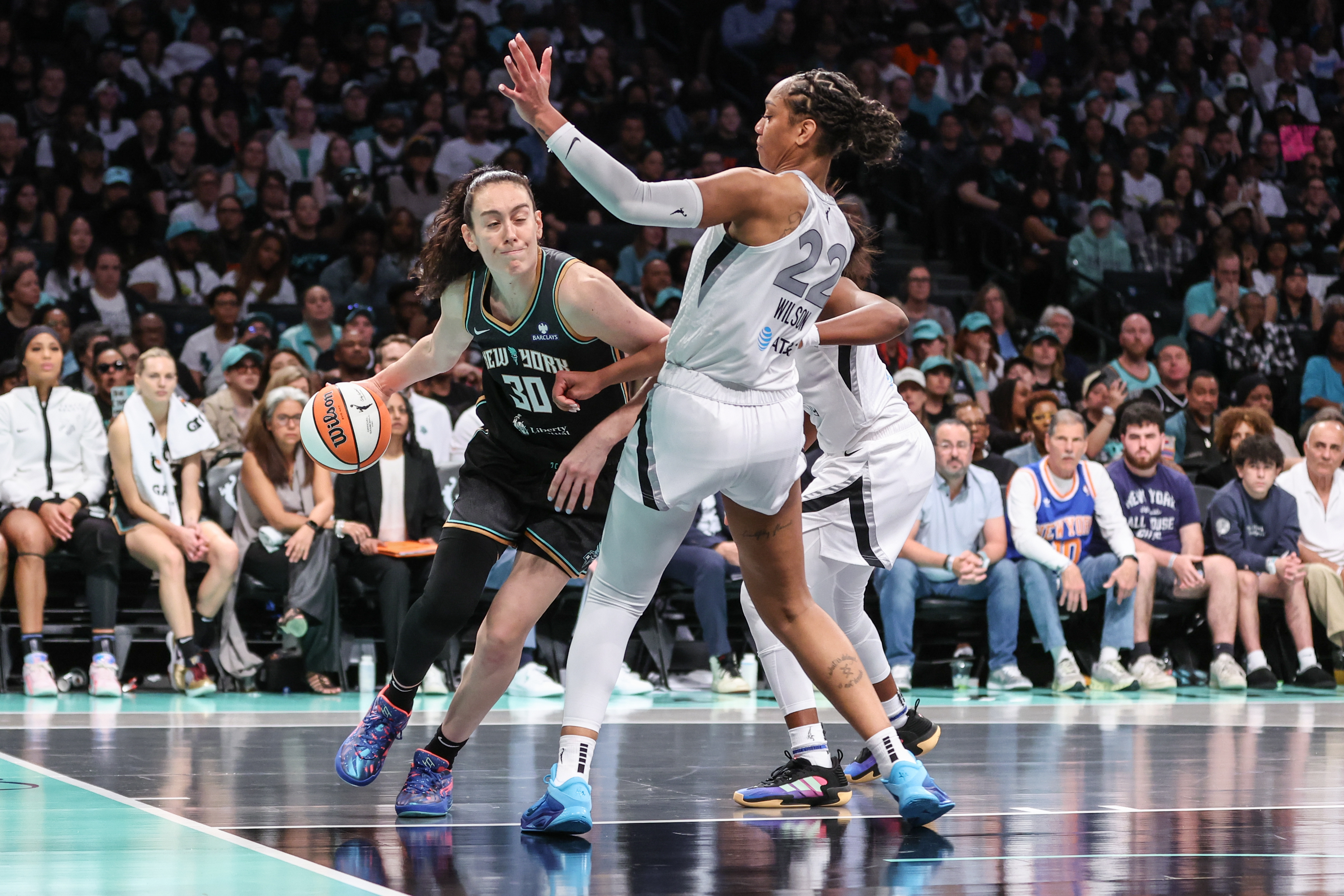 Breanna Stewart (30) and A'ja Wilson (22) have their teams atop the WNBA championship odds. 