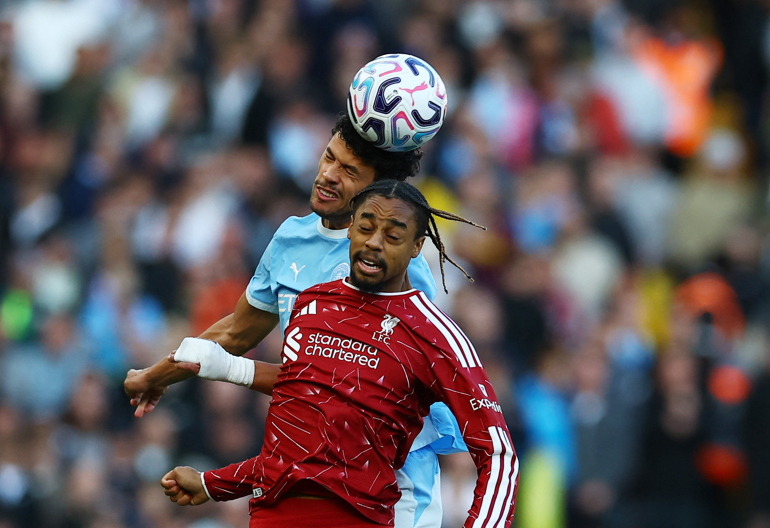 Liverpool's Bradley Barcola goes for a header as we make our best Brentford vs. Liverpool prediction