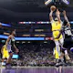 Anthony Davis of the Los Angeles Lakers shoots over Harrison Barnes of the Sacramento Kings. We're expecting Davis to have a big night in our Warriors vs. Lakers NBA player props