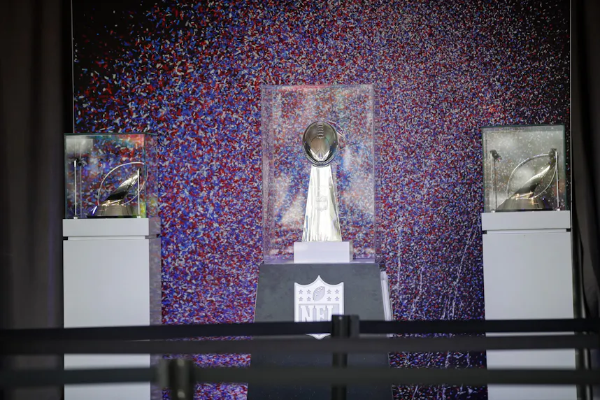The Lombardi Trophy with the AFC and NFC championship trophies as we look at the PrizePicks "SuperSweat" contest.