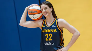 Caitlin Clark of the Indiana Fever poses for photographers during media day activities at Gainbridge Fieldhouse in Indianapolis, Ind. We're looking at all the Caitlin Clark odds as she makes her WNBA debut.