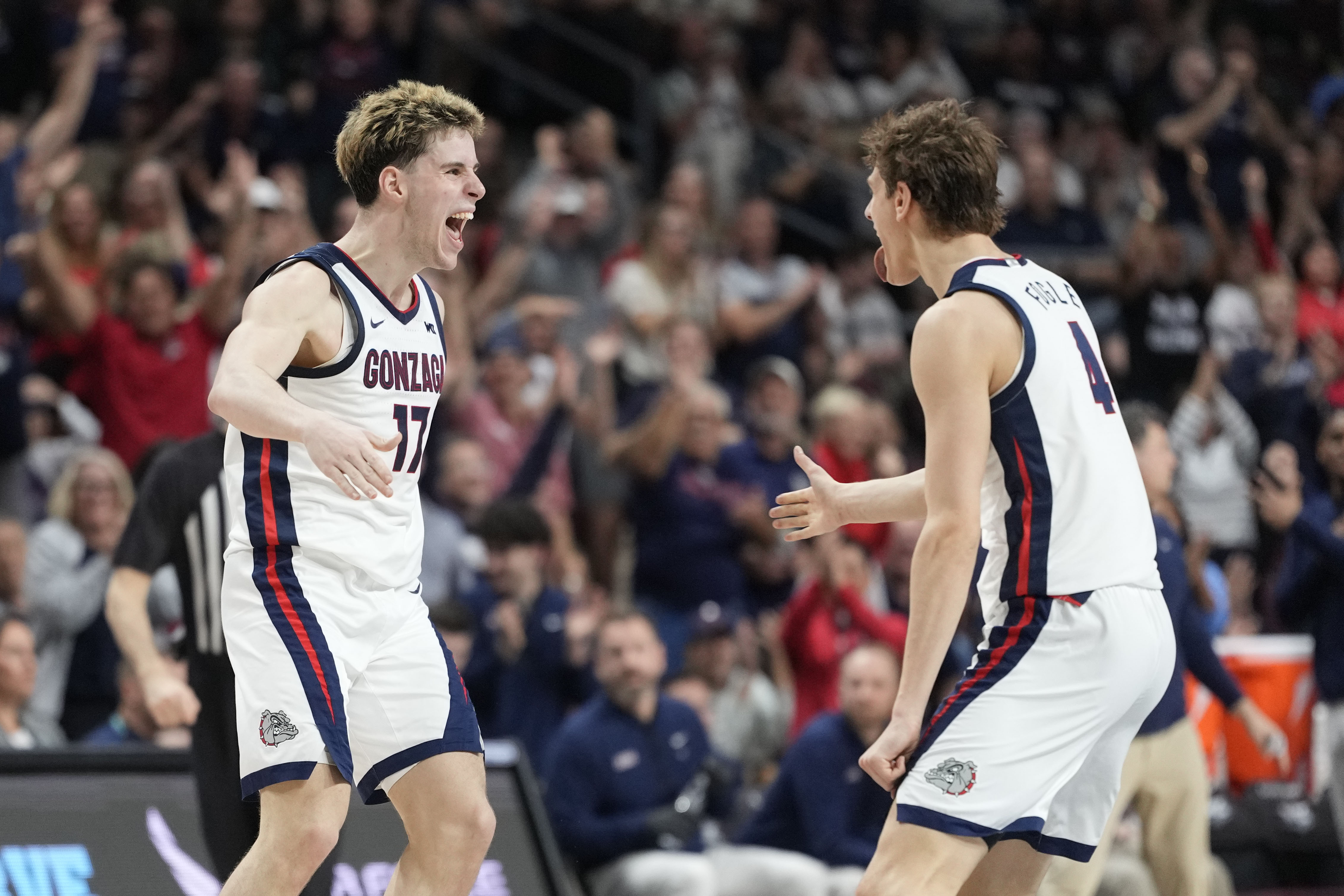 Gonzaga Bulldogs guard Mario Saint-Supery - who's featured in my Kennesaw State vs. Gonzaga prediction - and guard Davis Fogle celebrate. 