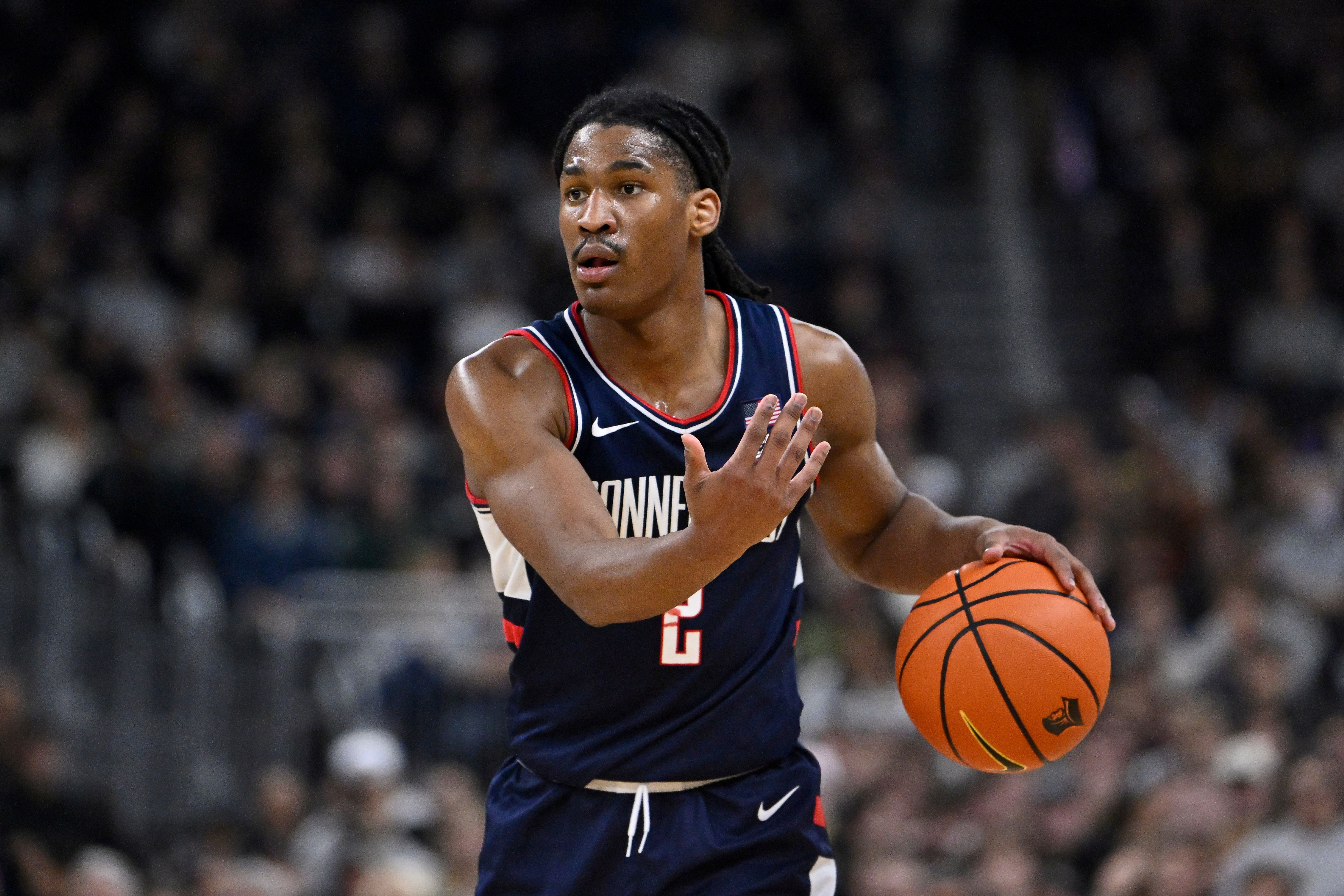 UConn Huskies guard Silas Demary Jr. gestures while dribbling during the second half, and he's key as we look at our Villanova vs. UConn prediction.