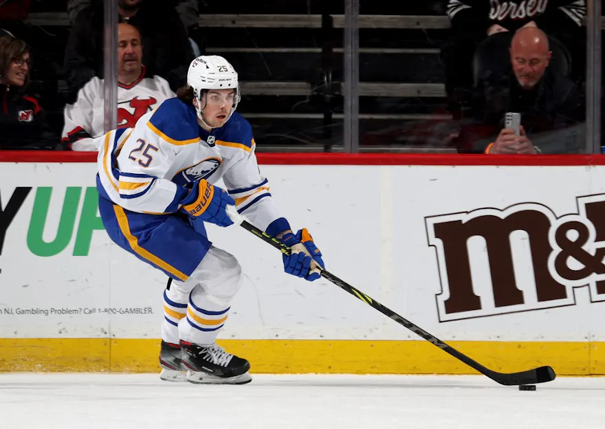 Owen Power #25 of the Buffalo Sabres takes the puck during the first period against the New Jersey Devils at Prudential Center on Apr. 21.
