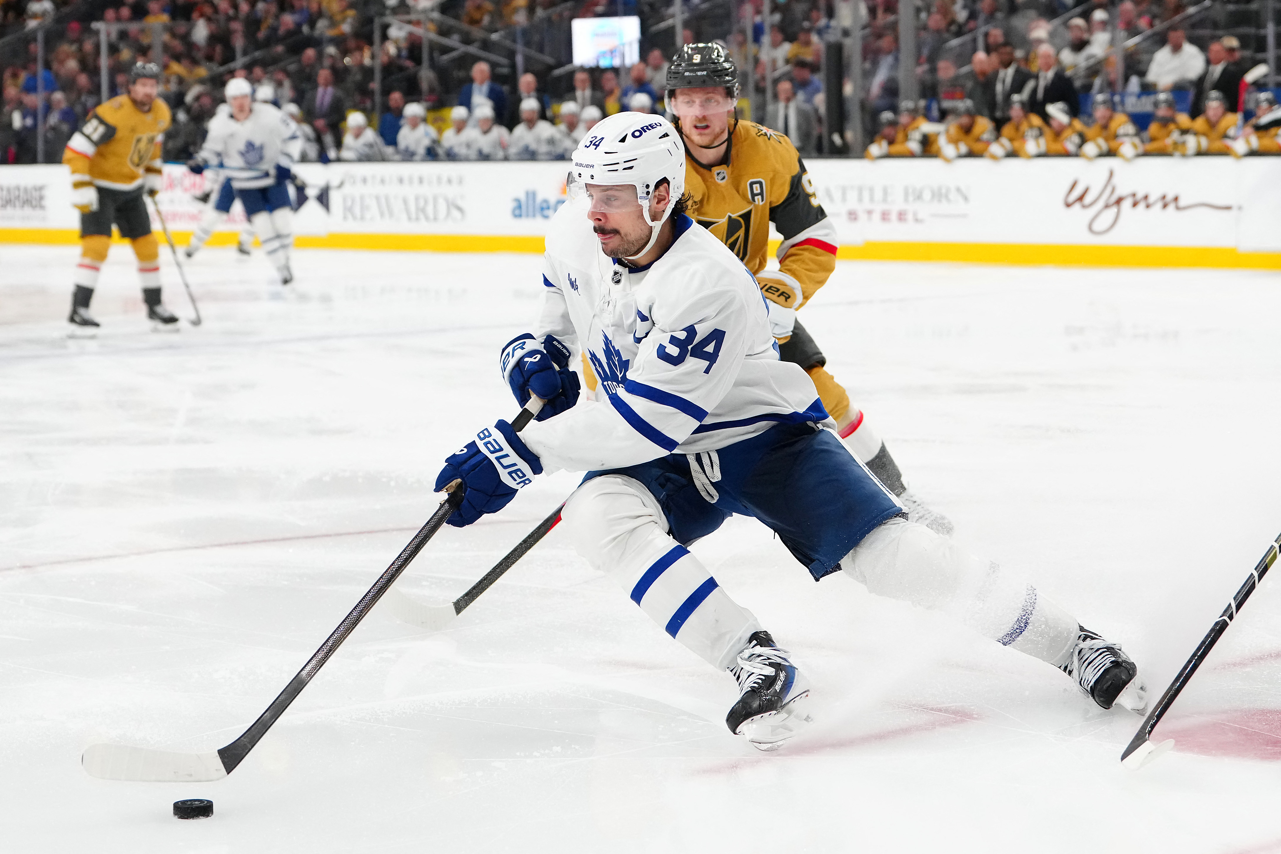 Toronto Maple Leafs center Auston Matthews (34) skates away from the defense as we provide our NHL anytime goal scorer predictions tonight.