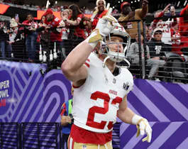 Christian McCaffrey of the San Francisco 49ers reacts as he runs onto the field before Super Bowl LVIII against the Kansas City Chiefs at Allegiant Stadium as we look at our 2025 Super Bowl odds.