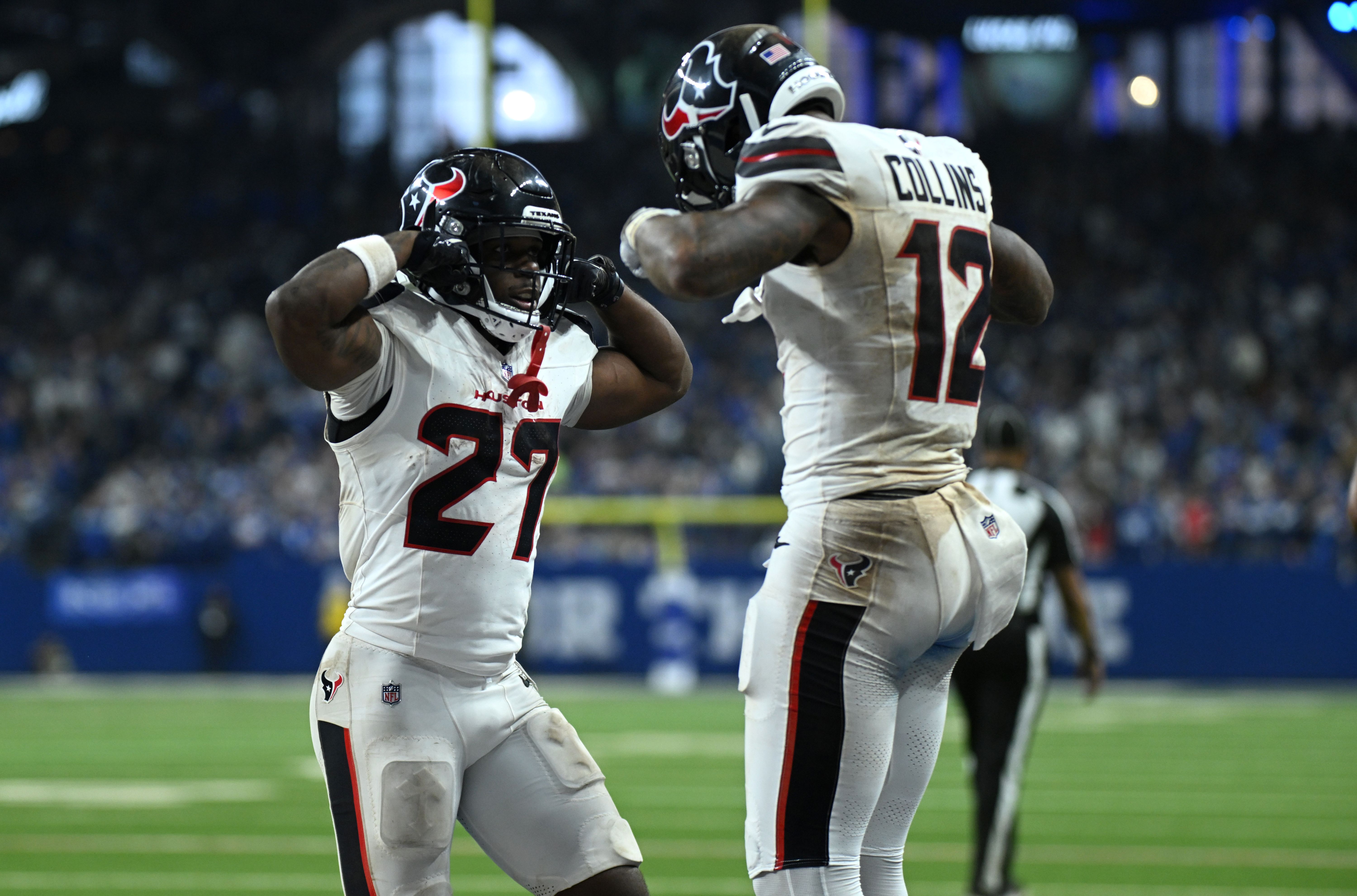 Houston Texans wide receiver Nico Collins celebrates with running back Woody Marks, and the latter is key to our Texans vs. Steelers same-game parlay.