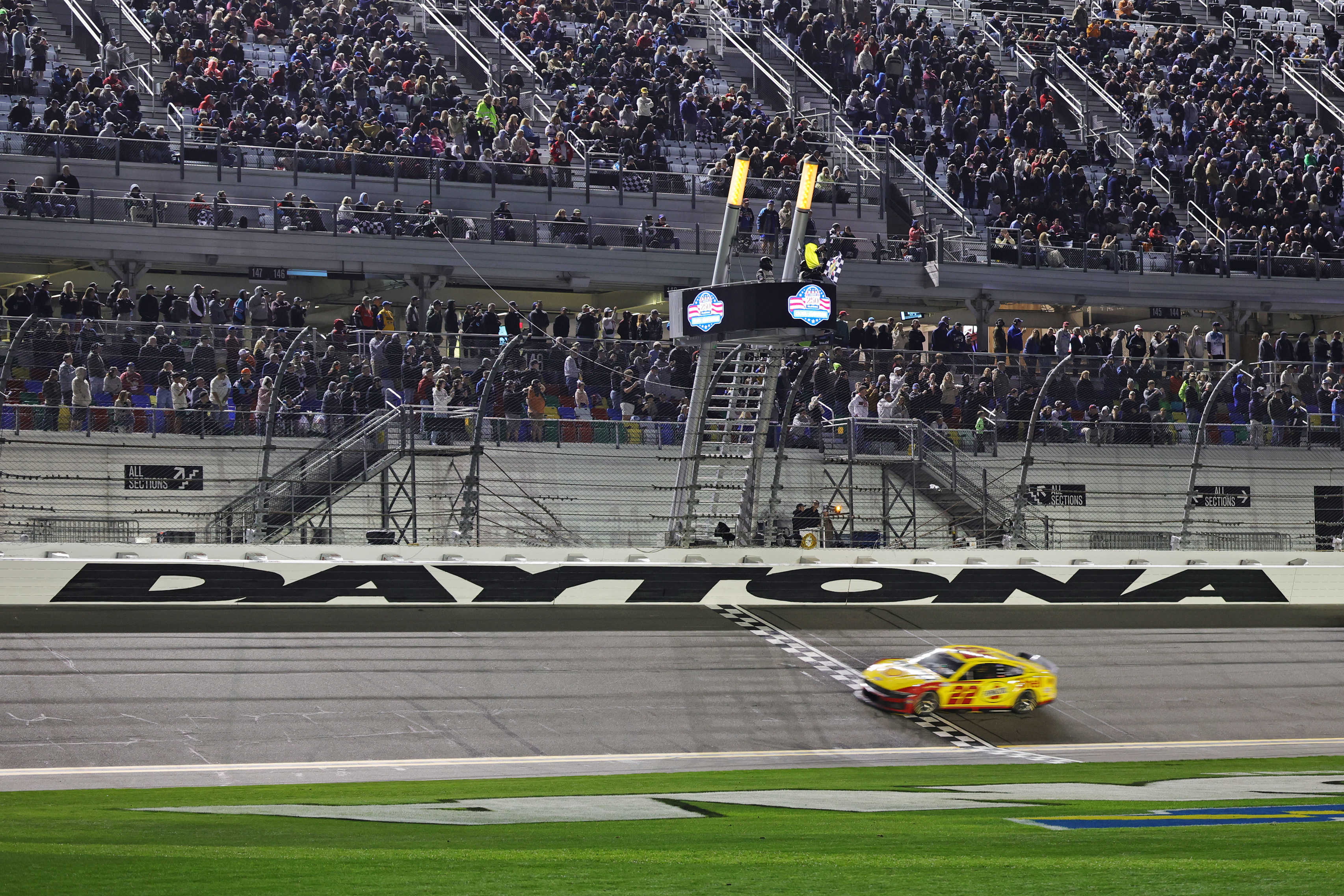 Driver Joey Logano (22) wins the Duel 1 at Daytona at Daytona International Speedway.
