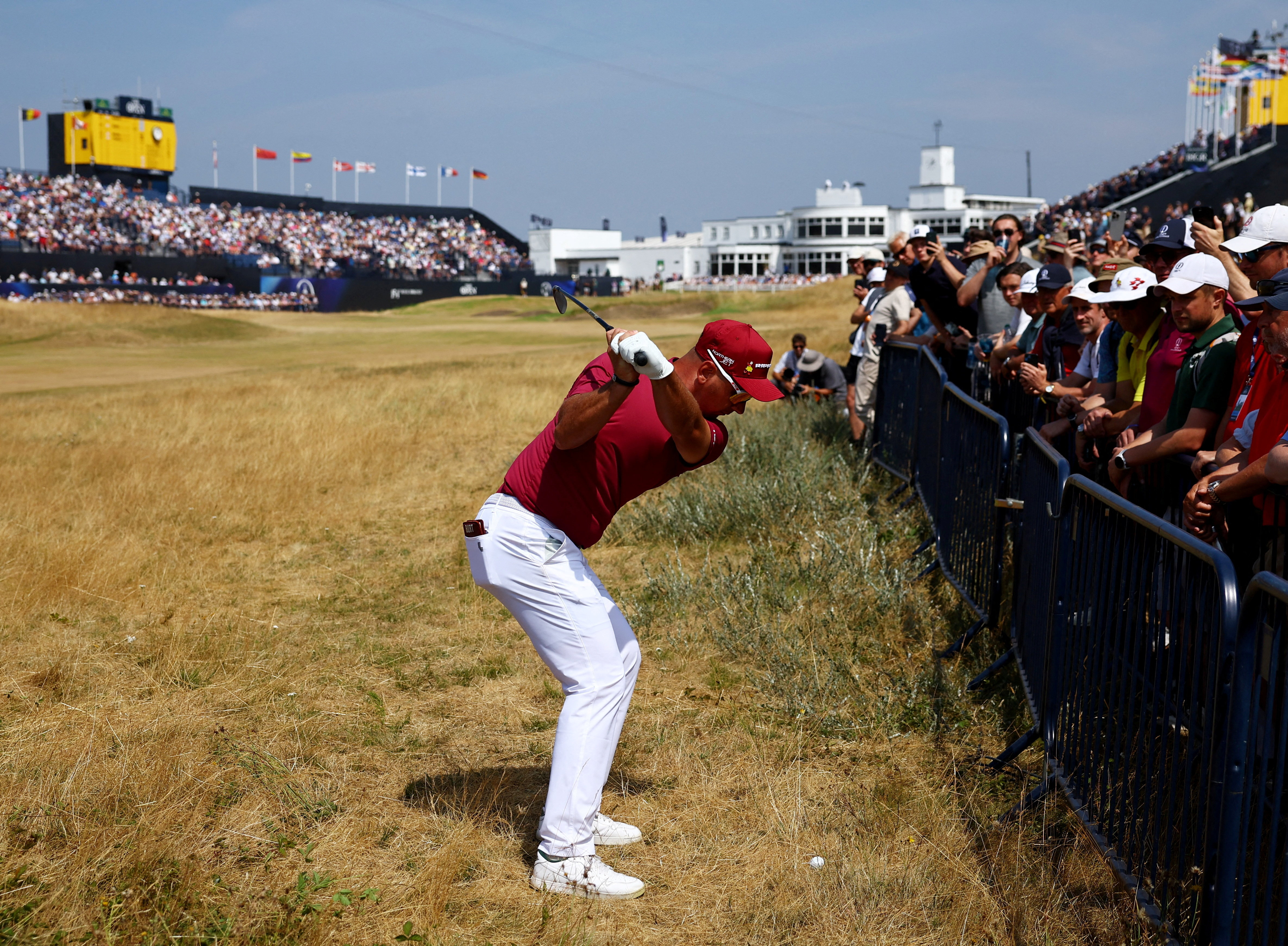 Australia's Lucas Herbert hits his approach as he is featured in our British Open Third-Round Leader prediction & odds.