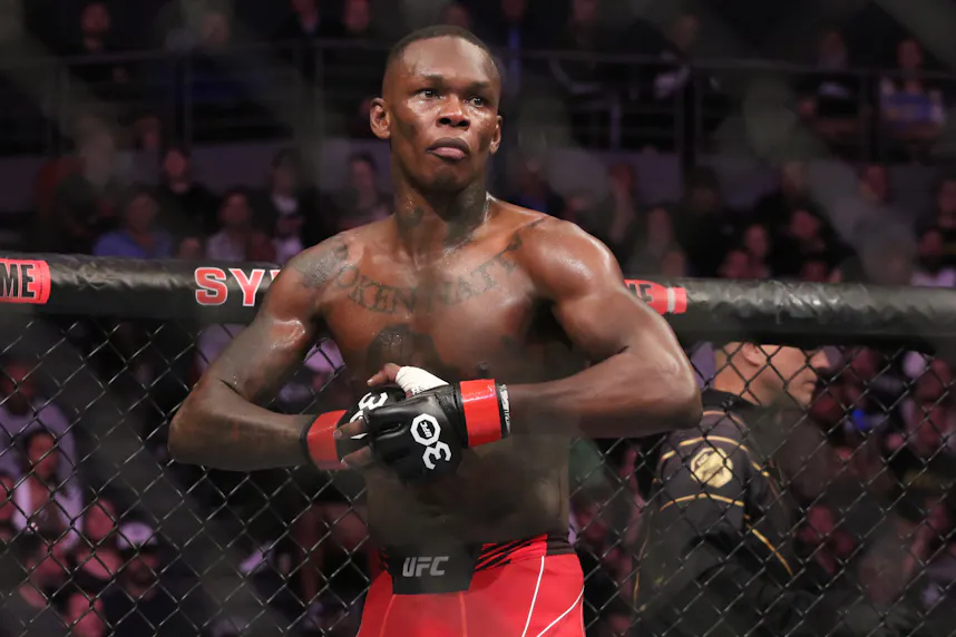 Israel Adesanya reacts as we offer our Du Plessis vs. Adesanya prediction and expert picks for Saturday's main event of UFC 305 in Perth, Australia.