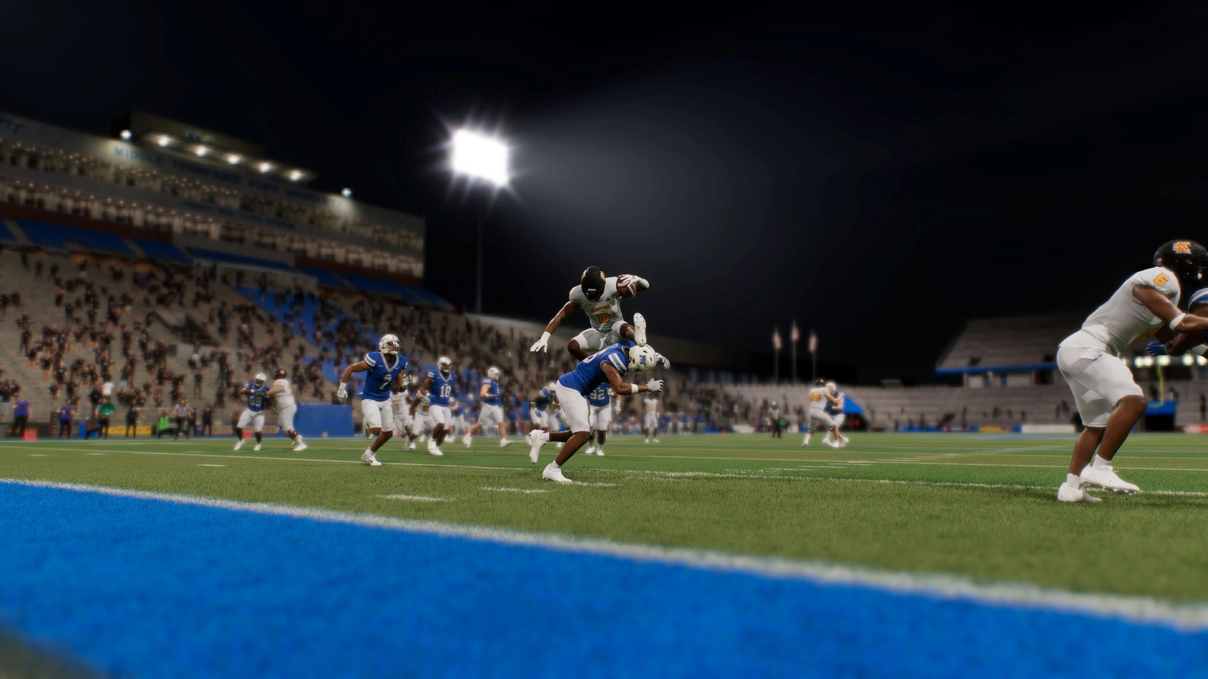 Pulling off a hurdle against Middle Tennessee State with Owls running back Michael Benefield. Screenshot via EA Sports College Football 25.