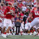 Jack Plummer #13 of the Louisville Cardinals rolls out to pass as we look at BetMGM bonus code for Louisville vs. NC State