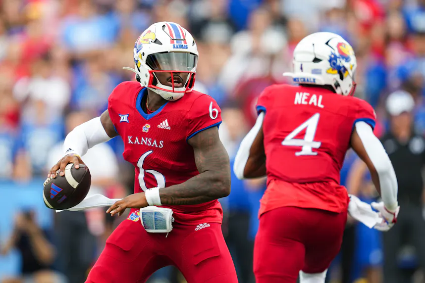 Kansas quarterback Jalon Daniels throws a pass against BYU. The Big 12 is among the best college football conferences for betting long shots.