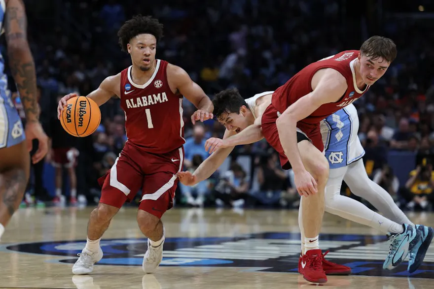 Mark Sears of the Alabama Crimson Tide drives against the North Carolina Tar Heels during the Sweet 16 round of the NCAA Men's Basketball Tournament. We expect a high-scoring game in our Clemson vs. Alabama expert picks and best bet.